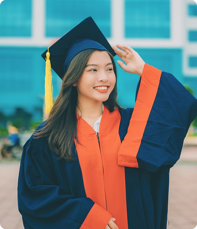 High school graduate celebrating after improving her ACT score with Quest IQ Pro